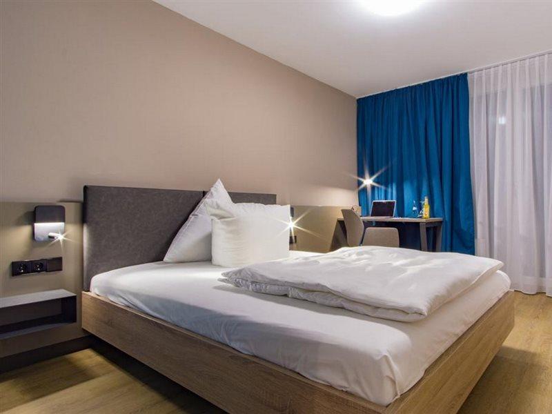 Hotel Berlin Зиндельфинген Экстерьер фото