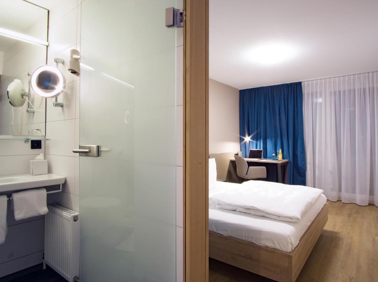 Hotel Berlin Зиндельфинген Экстерьер фото